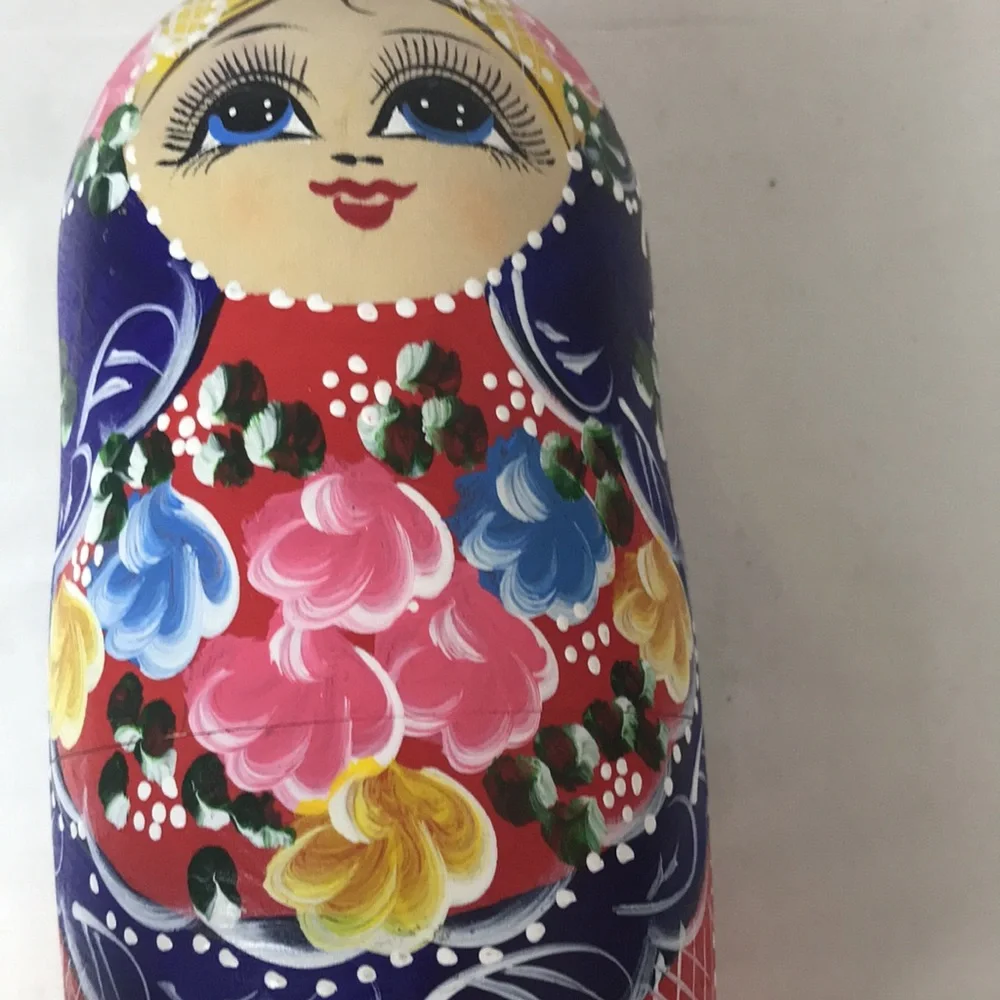 Beautifully decorated nesting dolls set